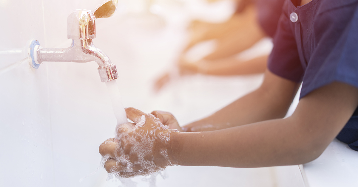 close up hands of children or Pupils At preschool Washing hands with soap under the faucet with water,copy space for text or product you. clean and Hygiene concept; blog: staying healthy during flu season