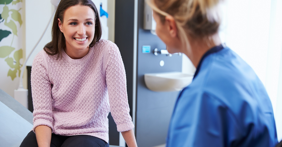 Female Patient And Nurse Have Consultation In Hospital Room; blog: Why Preconception Care Matters