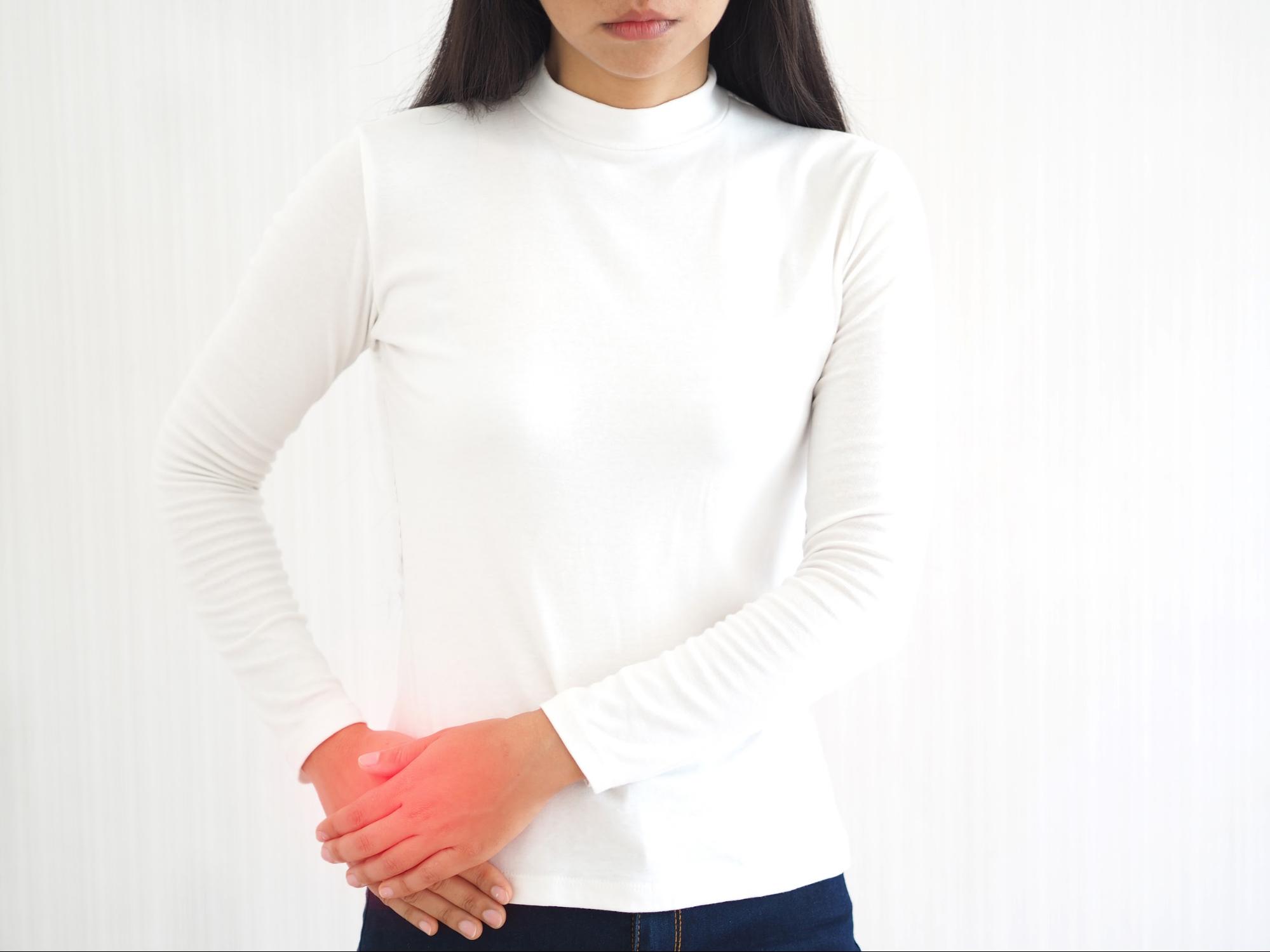 a woman experiencing pelvic pain